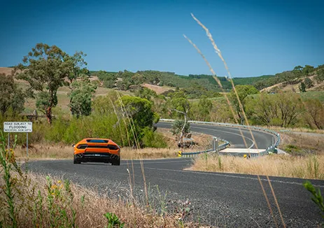 Drive a fleet of supercars through country NSW on a luxury driving holiday