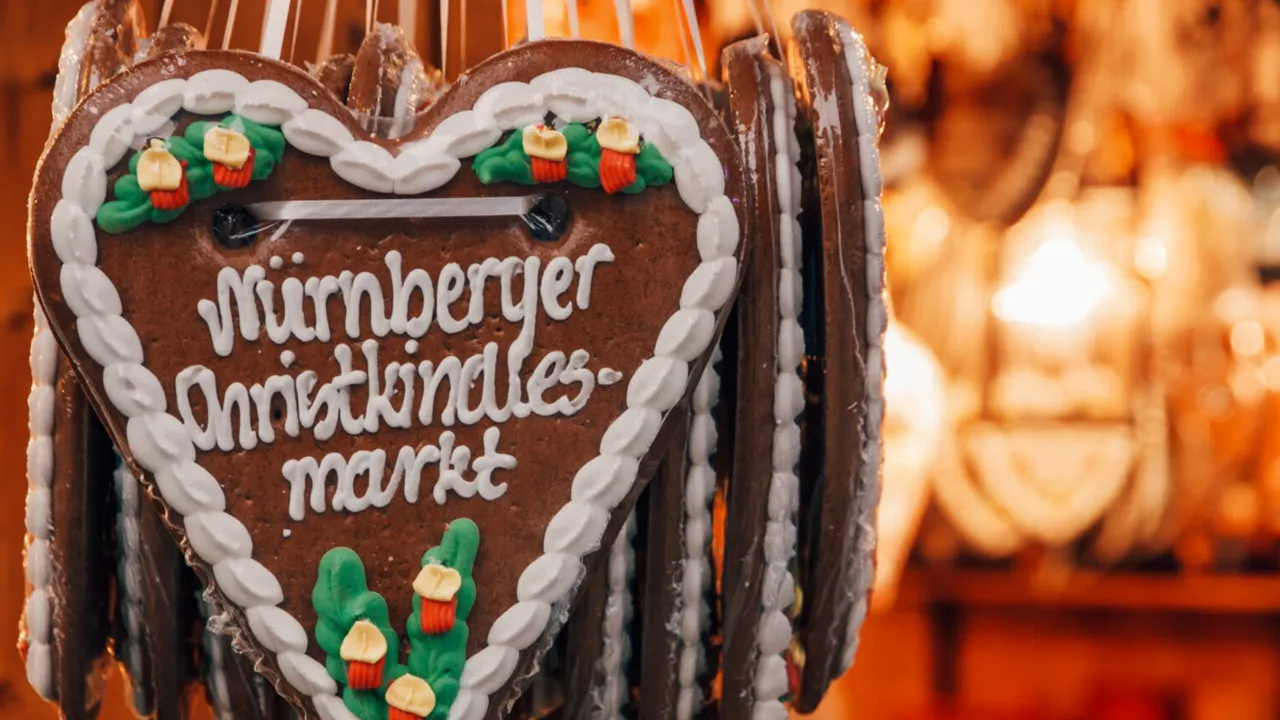 An iced gingerbread biscuit with white piping of Nürenberger Christkindles Market