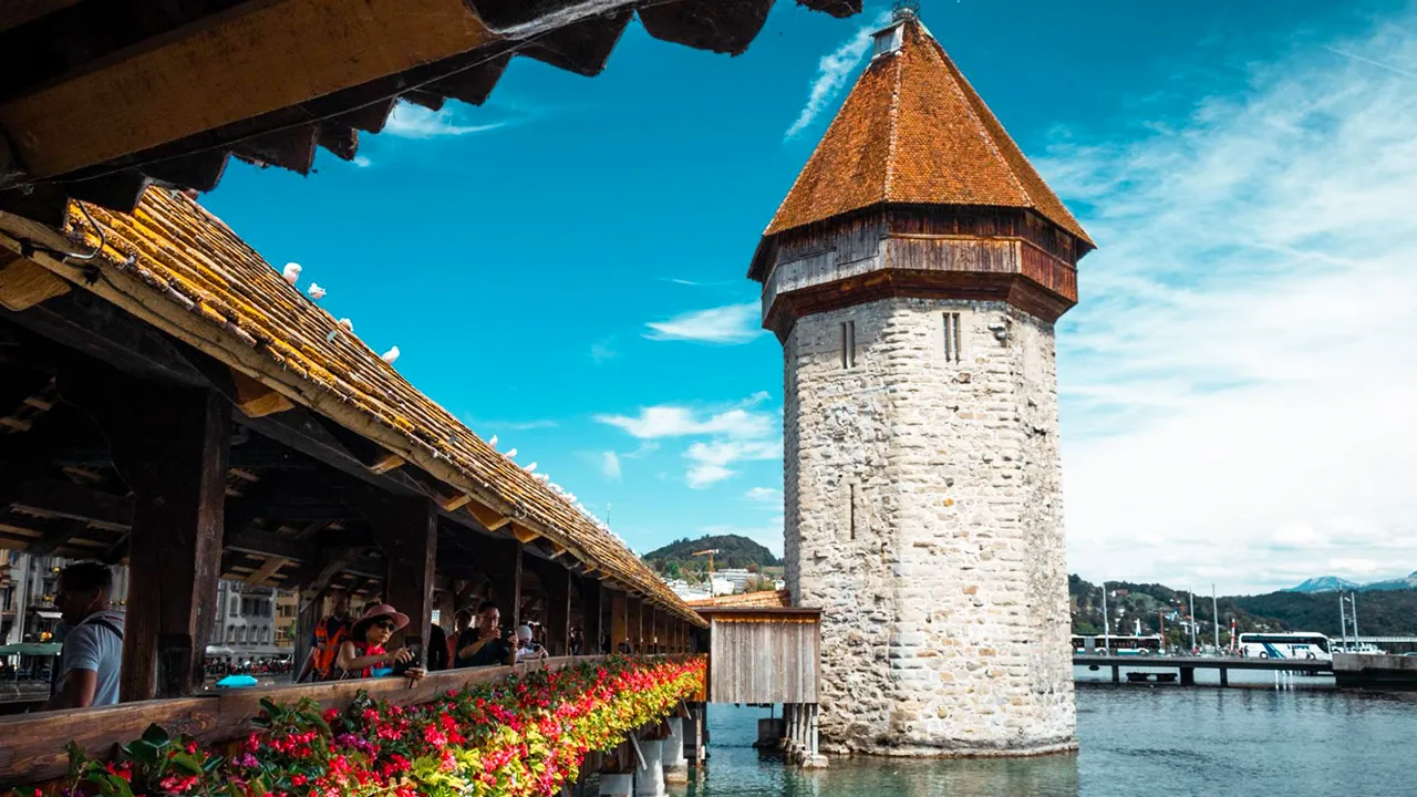 A view of the flowers across the side of Chapel Bridge in Lucerne, Switzerland.