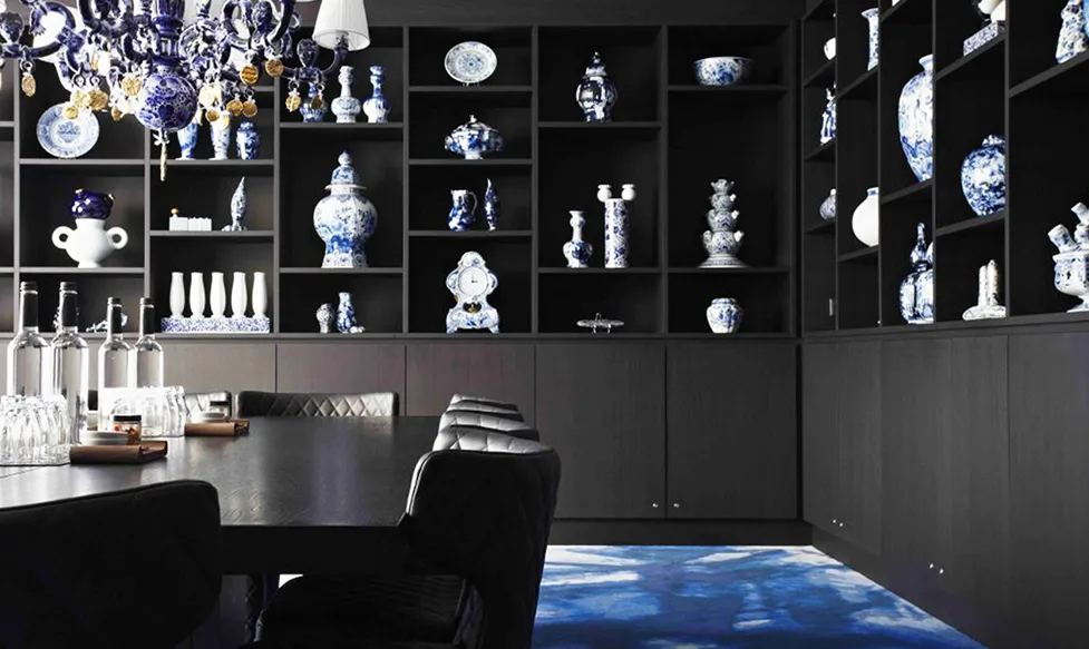 Blue china occupies wall cupboards in the quirky and elegant dining room at Hotel Andaz