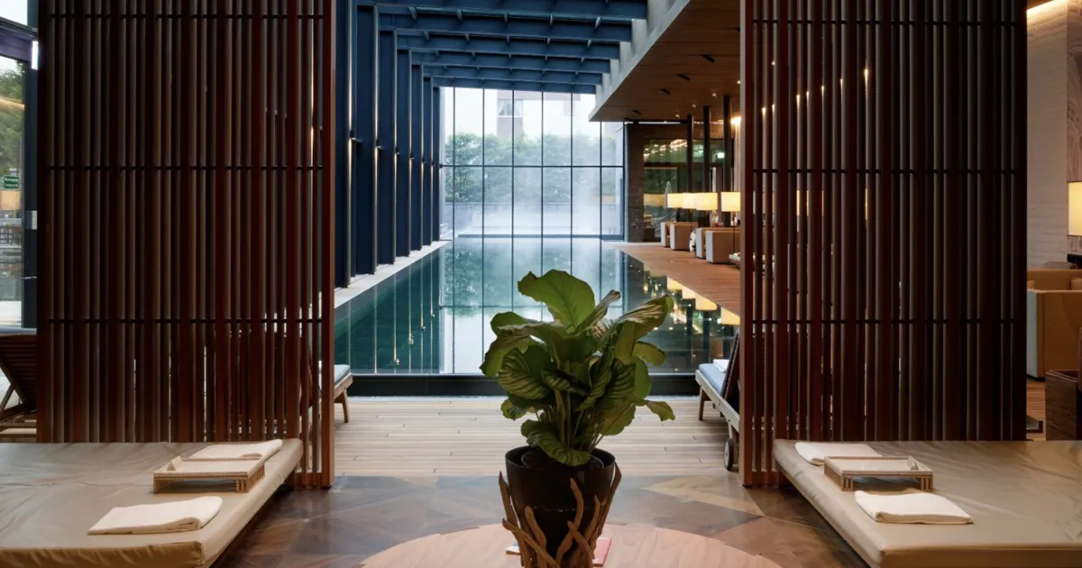 Steam rises from an indoor pool at The Chedi, an Ultimate Driving Tours partner hotel in Switzerland.