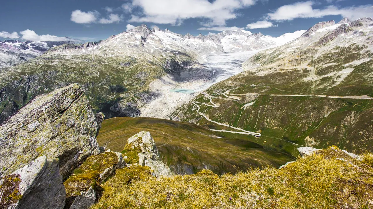 Looking across the valley to Grimsel Pass and its lake below.