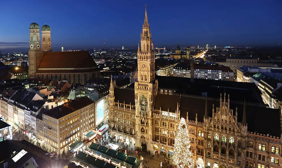 Grand old buildings in Munich, Germany seen from the exterior at night time