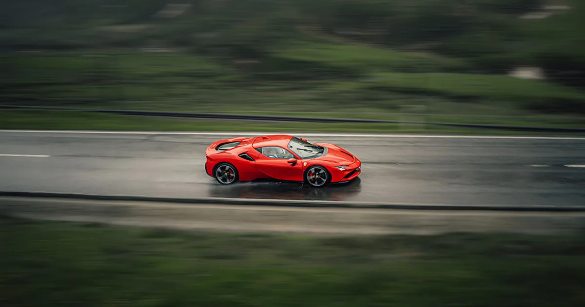 Ferrari driving on the German autobahn on a supercar tour