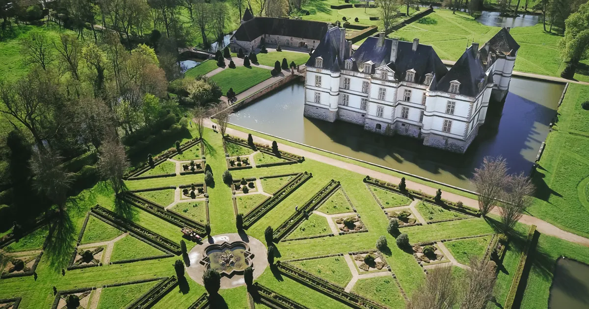 Château de Cormatin surrounded by a moat.