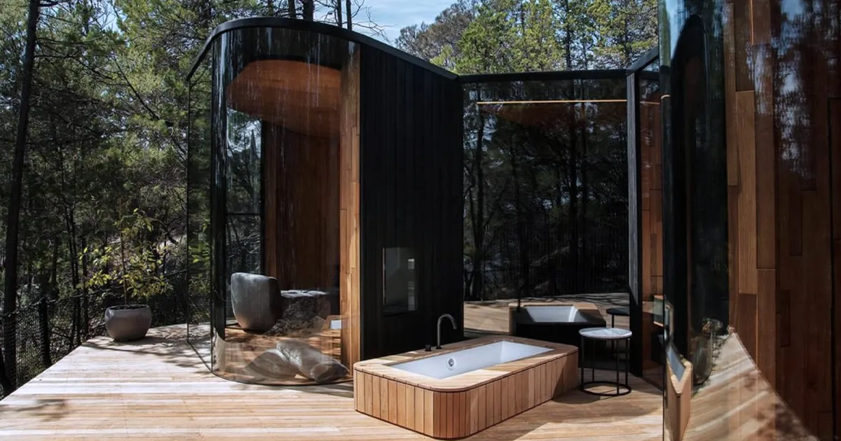 A stylish suite is nestled in bushland at Freycinet Lodge, Tasmania. 