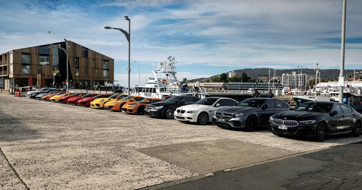 An assembly of guests’ supercars and sports cars on the UDT Tasmanian Supercar Tour.