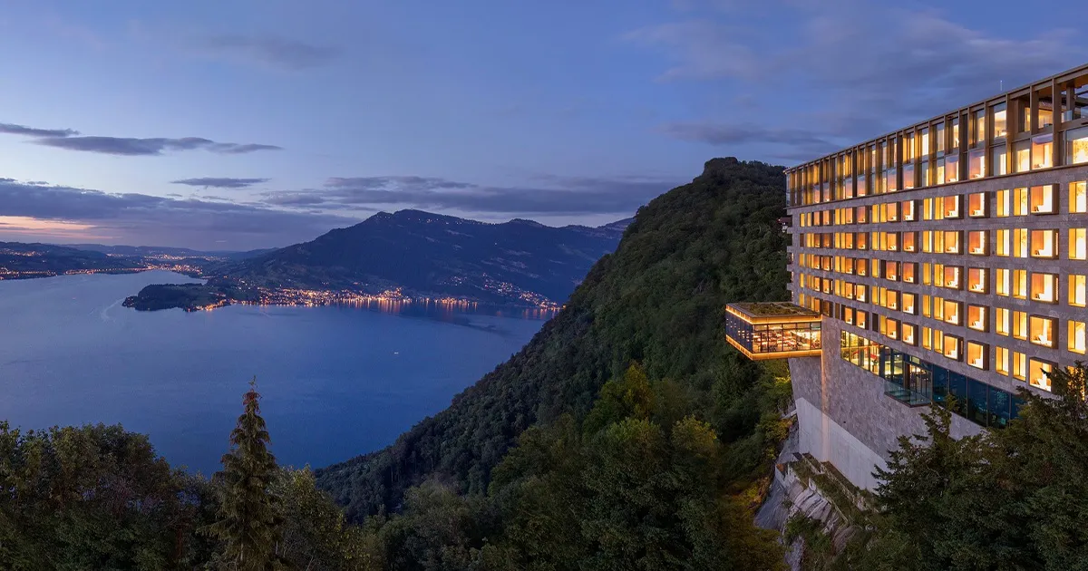 The Bürgenstock Resort is illuminated up above Lake Lucerne, Switzerland