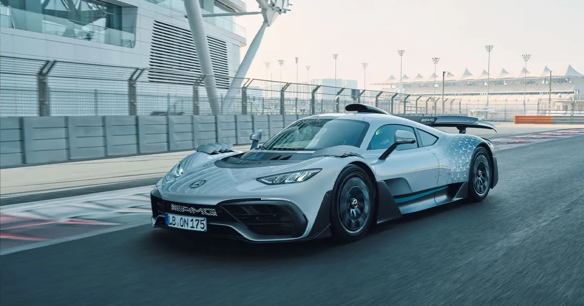 A grey Mercedes-AMG ONE races around a circuit
