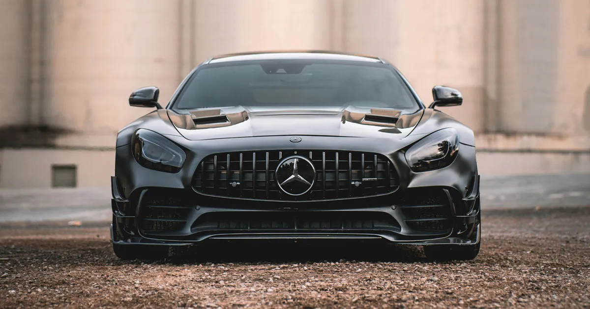 A black Mercedes-AMG GTR from a low front-on perspective