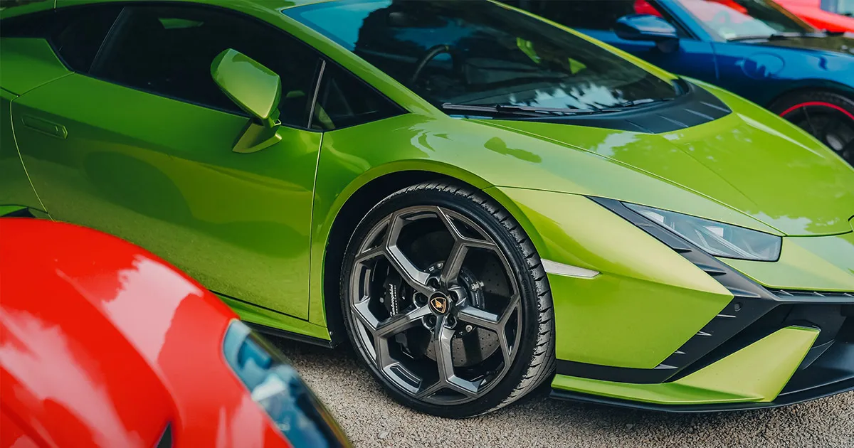 A lime green Lamborghini Huracán with performance wheels and brake upgrades