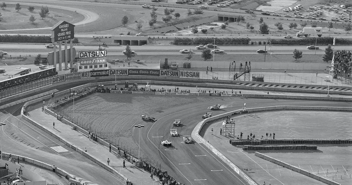 An elevated view of cars on a makeshift F1 track in Las Vegas during the 1980s