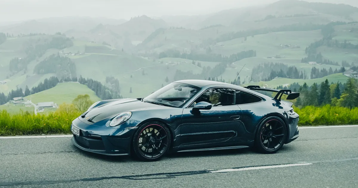 A dark blue Porsche 911 GT3