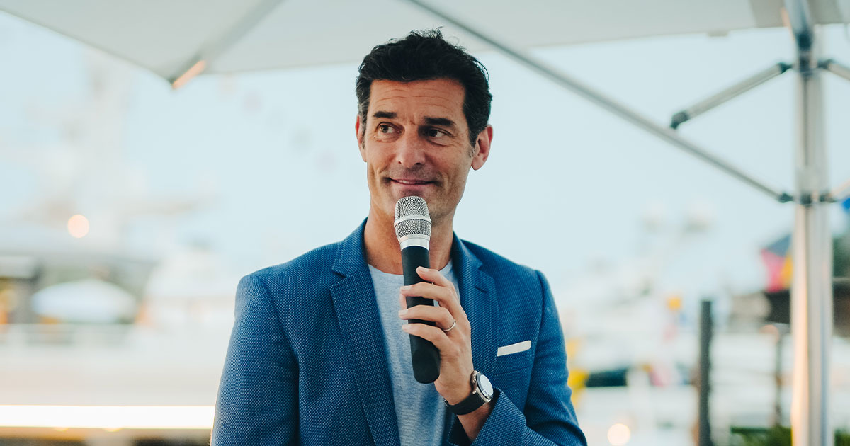 Mark Webber giving a speech for Ultimate Driving Tours