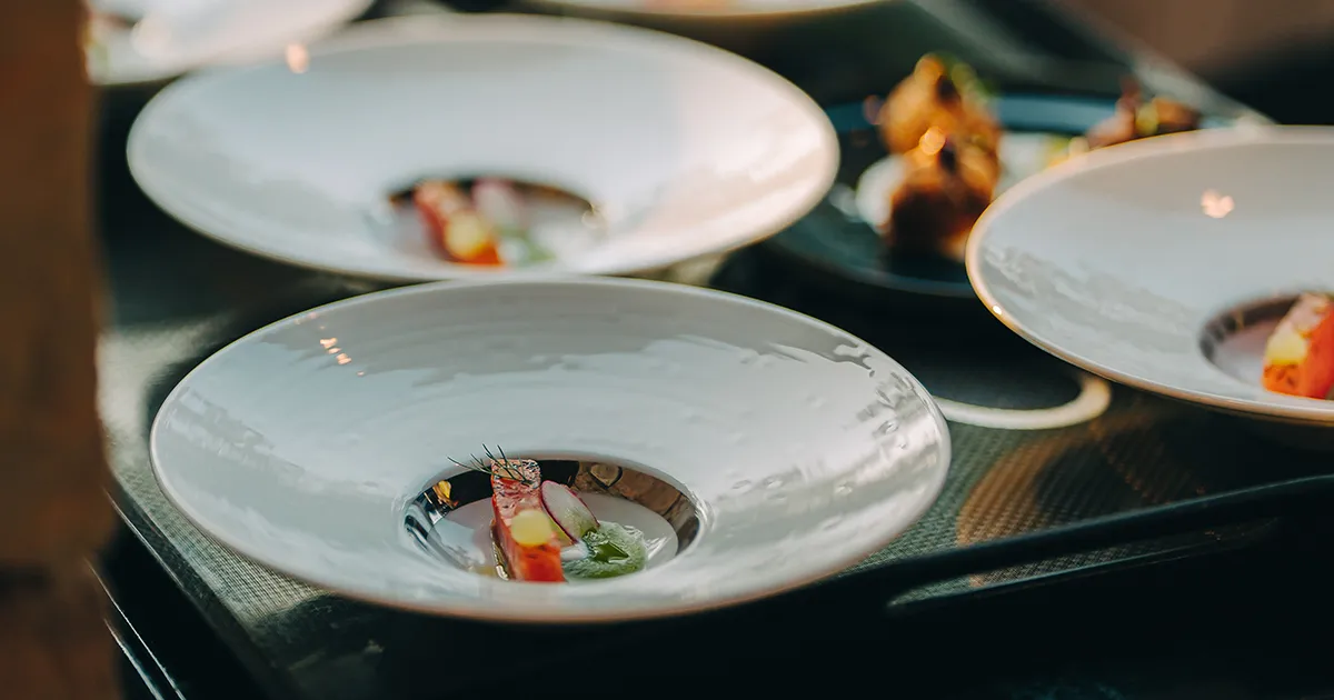 A carefully presented set of entrée bowls ready for serving.