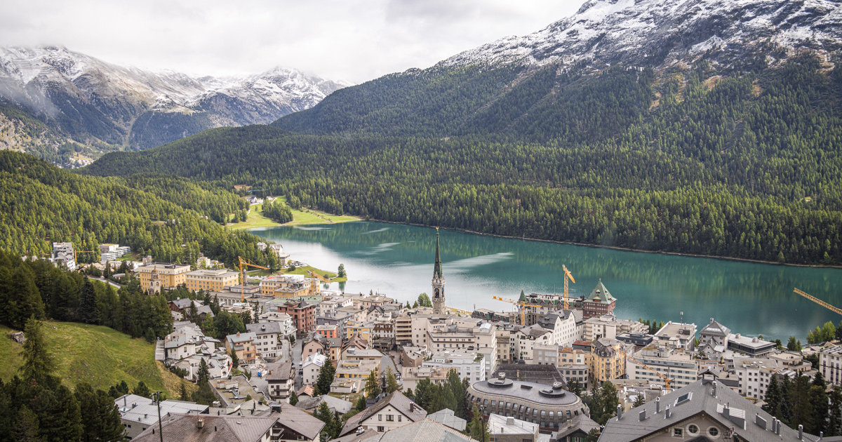 Lake St. Moritz and its eponymous town in Switzerland’s Engadine valley on a clear day