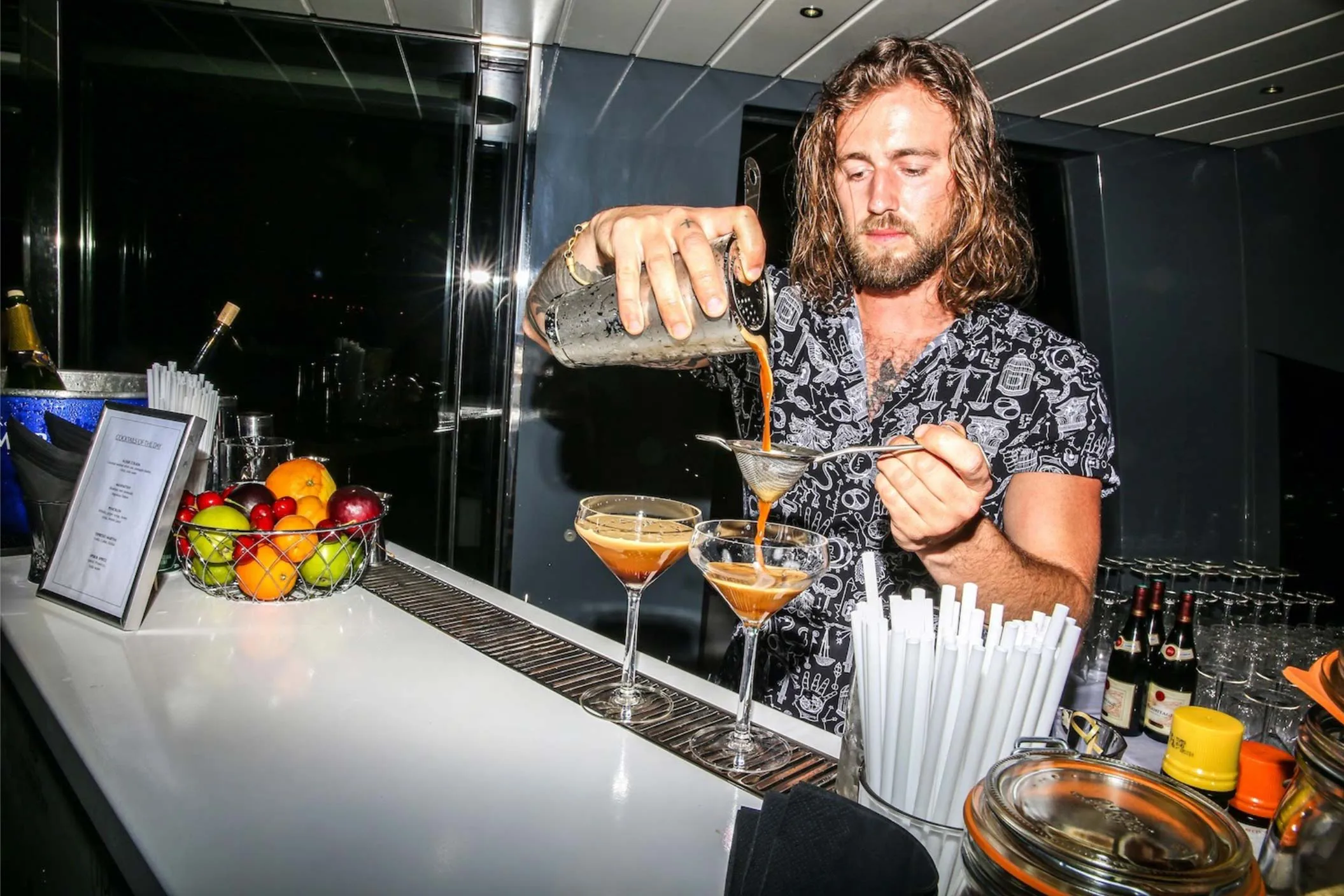 a barman prepares two Espresso Martinis