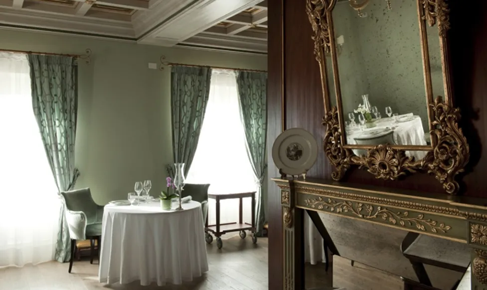 An elegant dining room at Villa Cordevigo in Maranello, Italy