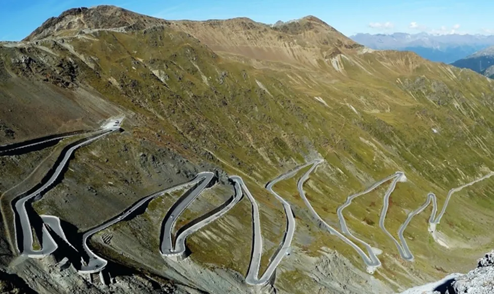 A series of steep and winding turns are carved into a mountainside on the Timmelsjoch pass in the Italian Alps
