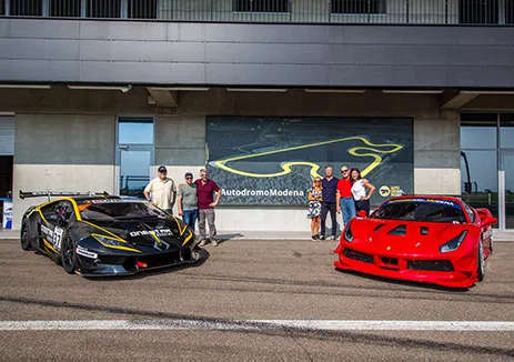 Drive Ferraris and Lamborghinis at a private track day in Italy as part of a luxury holiday package