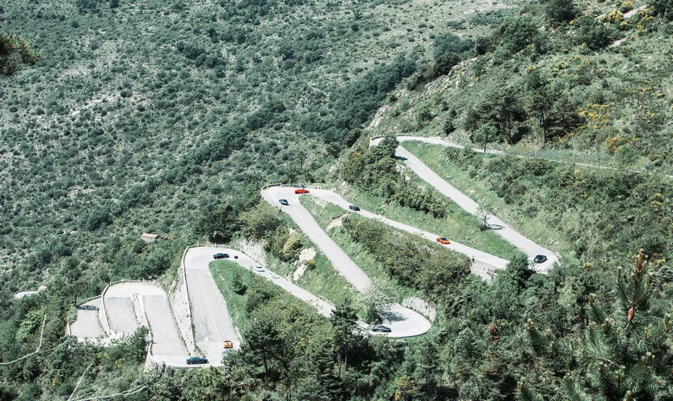 Supercars climb the dramatic balcony roads above Monaco on Ultimate Driving Tours’ European supercar tour