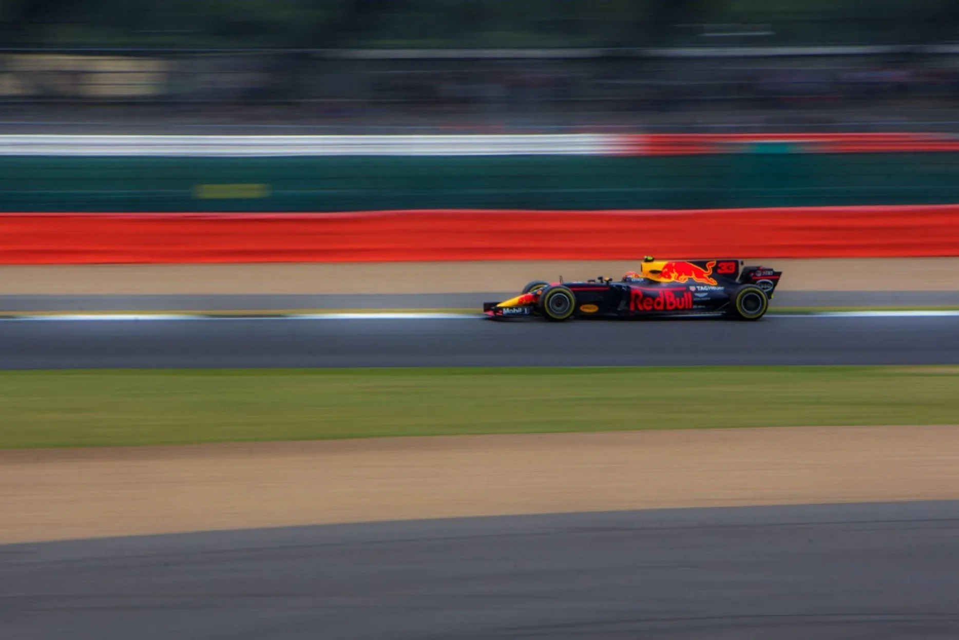 A Red Bull Formula 1 car on a racetrack.