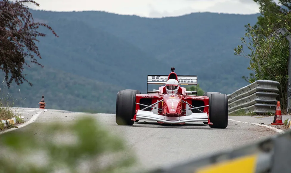 An F1 car being driven by an Ultimate Driving Tours guest in France