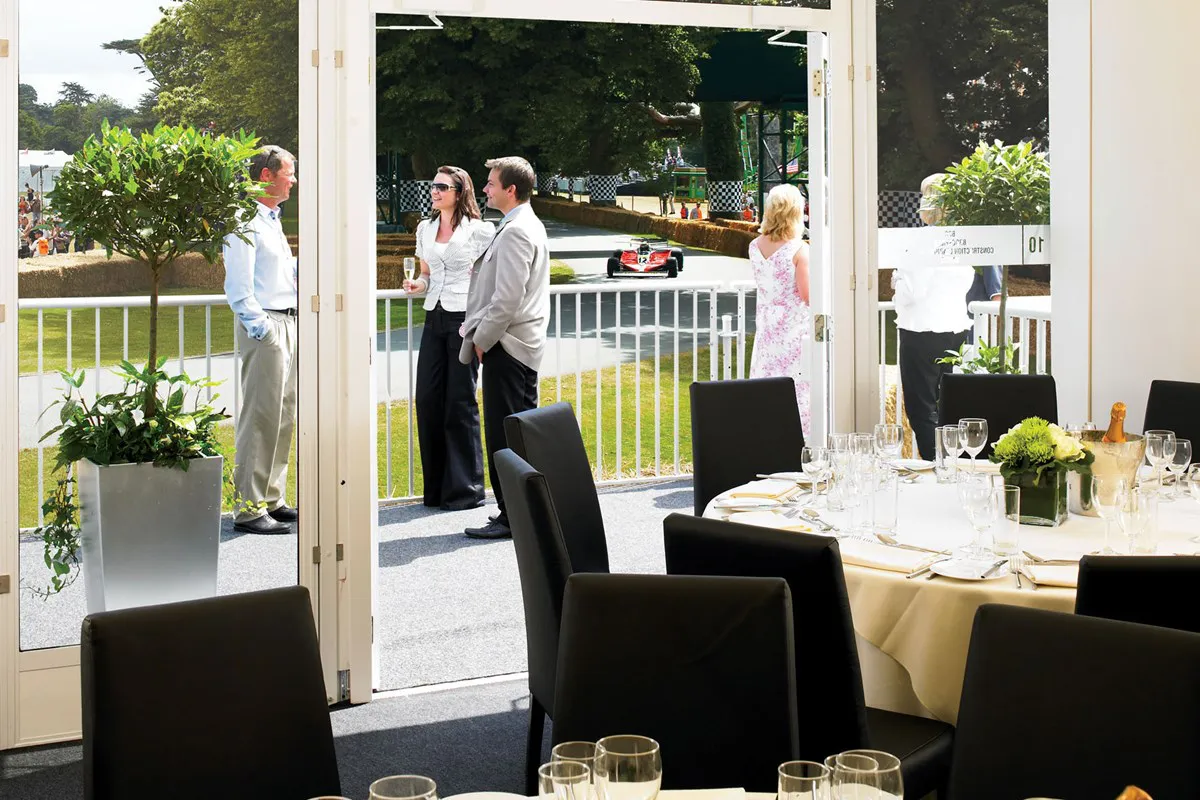 Guests enjoying champagne and corporate hospitality in Clark Pavilion at Goodwood FoS