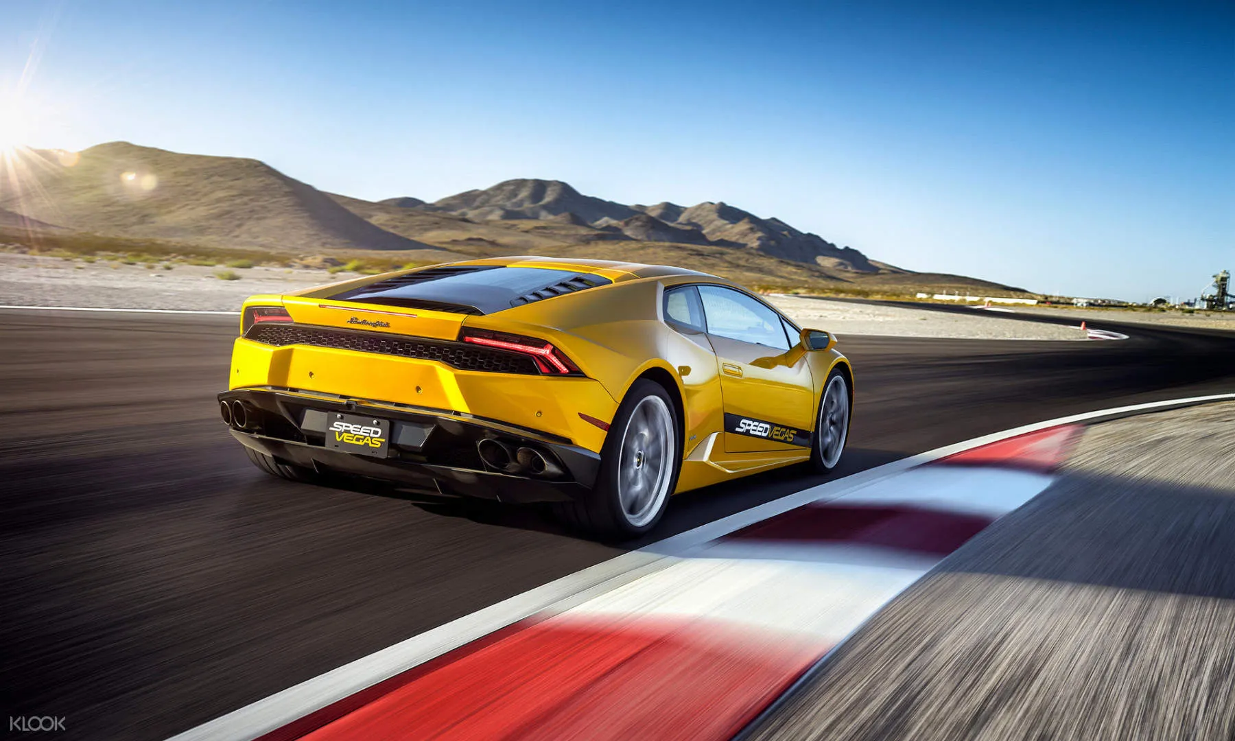 Lamborghini driving on a track in Las Vegas on a supercar track day